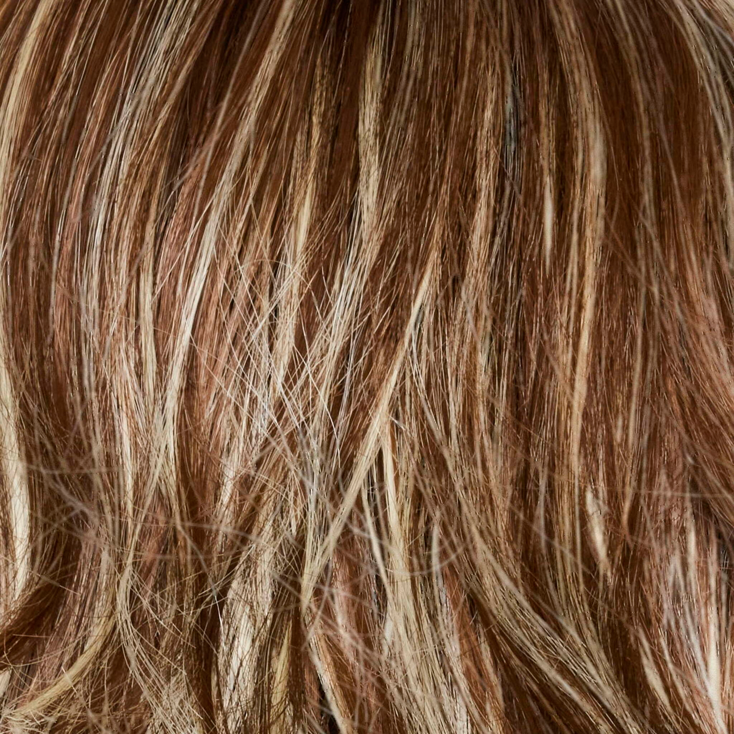 Snowy Umber-R - A medium ginger brown base with white blond highlights.
