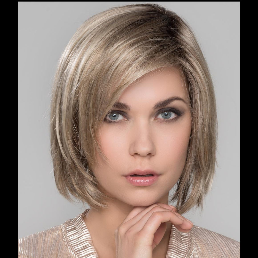 SMOKE-HIM MONO by ELLEN WILLE in SANDY BLONDE ROOTED | Medium Honey Blonde, Light Ash Blonde, and Lightest Reddish Brown blend with Dark Roots