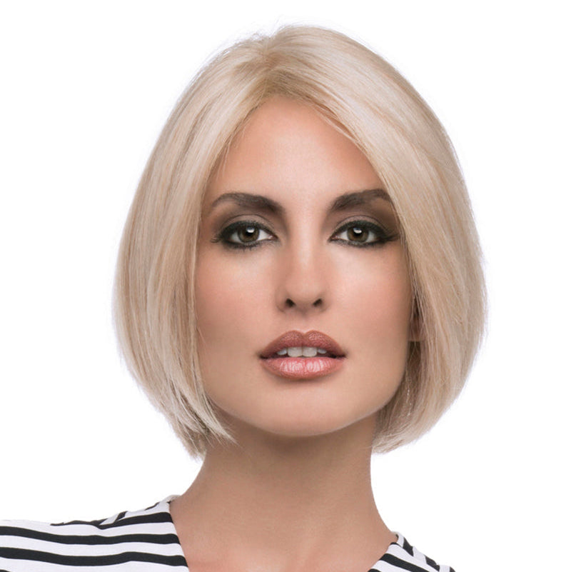 headshot of model wearing blonde chin length wig