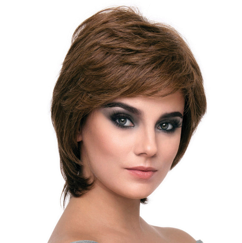 headshot of model wearing brown chin length wig