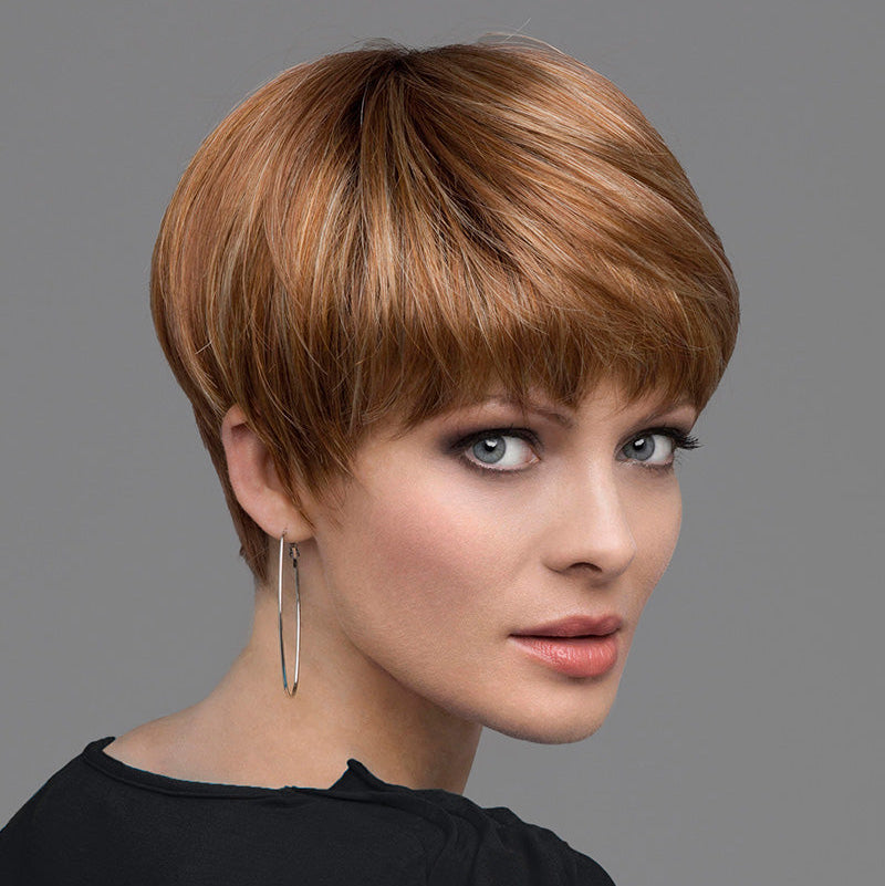 headshot of model wearing red bowl cut style wig