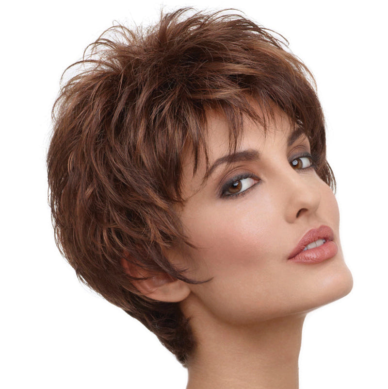 headshot of model wearing brown spiky wig