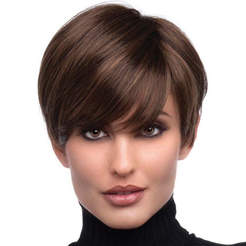 headshot of model wearing brown pixie style wig
