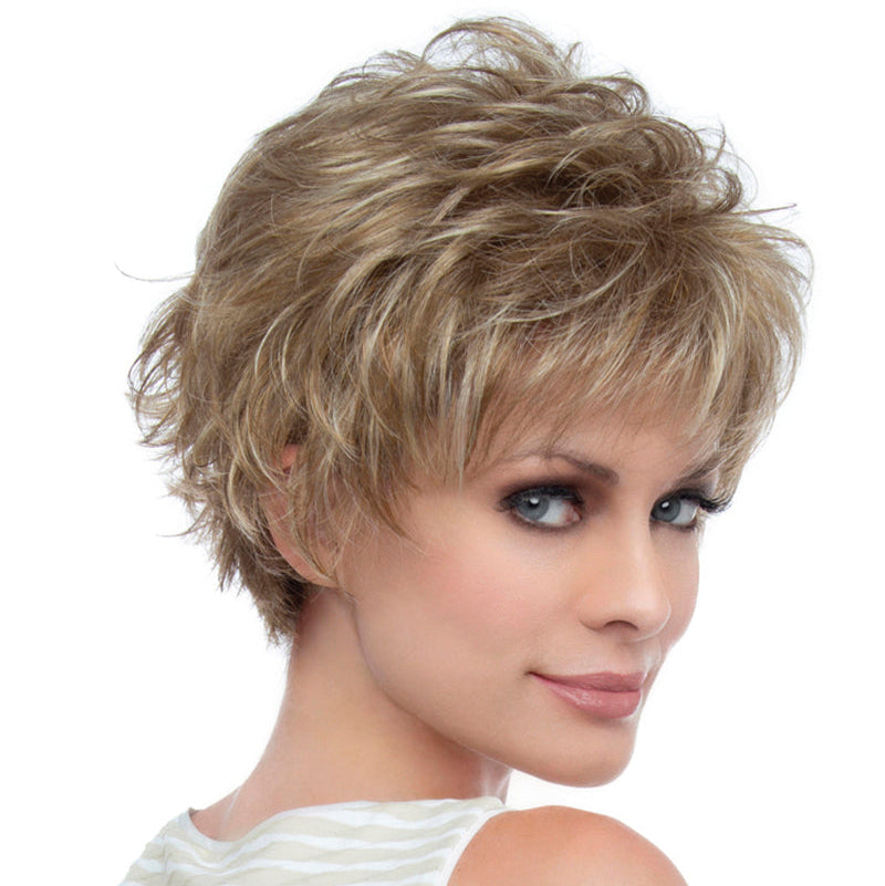 headshot of model wearing dirty blonde spiky wig