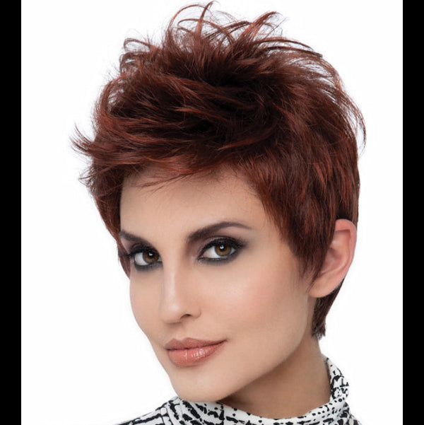 headshot of model wearing dark red spiky style wig