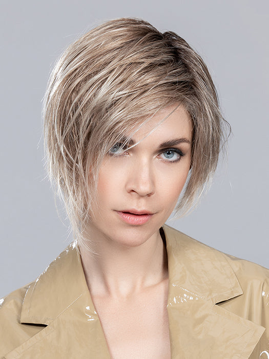 RICH MONO by ELLEN WILLE in PEARL BLONDE ROOTED 49.101.14 | Dark Ash Blonde Blended with Grey and Pearl Platinum and Medium Ash Blond Blend with Shaded Roots
