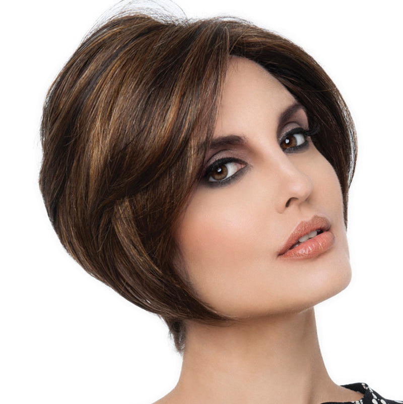 Headshot of model wearing brown chin length wig