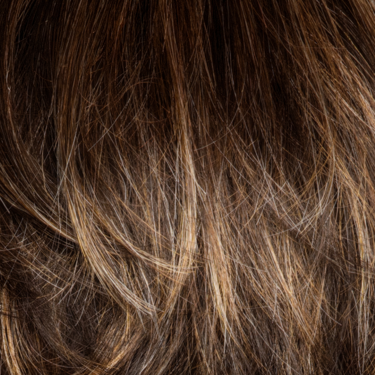 Chocolate Twist-R  -  A beautiful blended blond, that boasted an array of toffee, burnt toffee, fudge blond, milk chocolate, and deep golden blond tones. Cinder Toffee is a very flattering color and suits all skin tones.