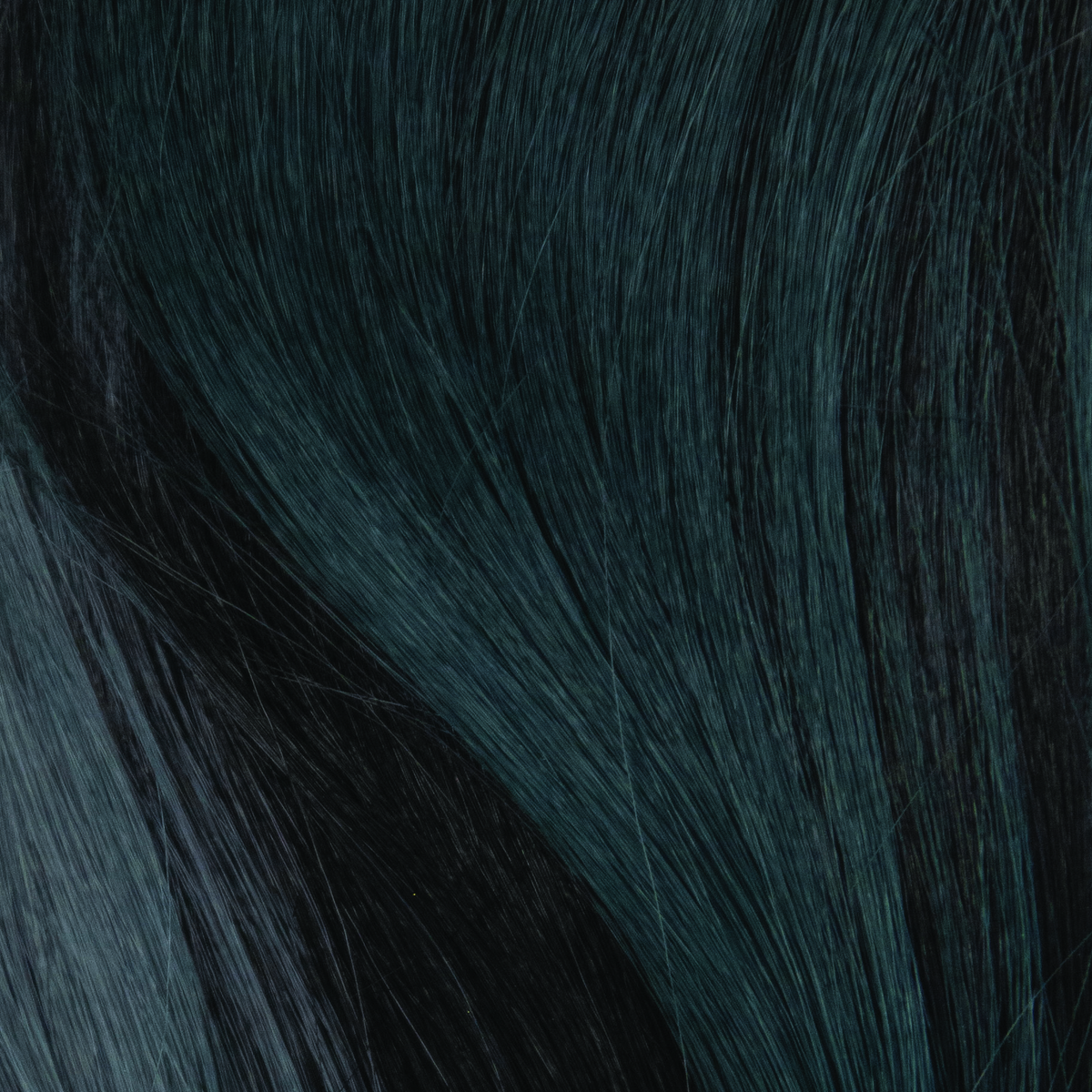 Cosmic Teal  -  A smoky fused deep teal base with off-black lowlights throughout. Nocturnal vibe with a cool, sophisticated attitude.