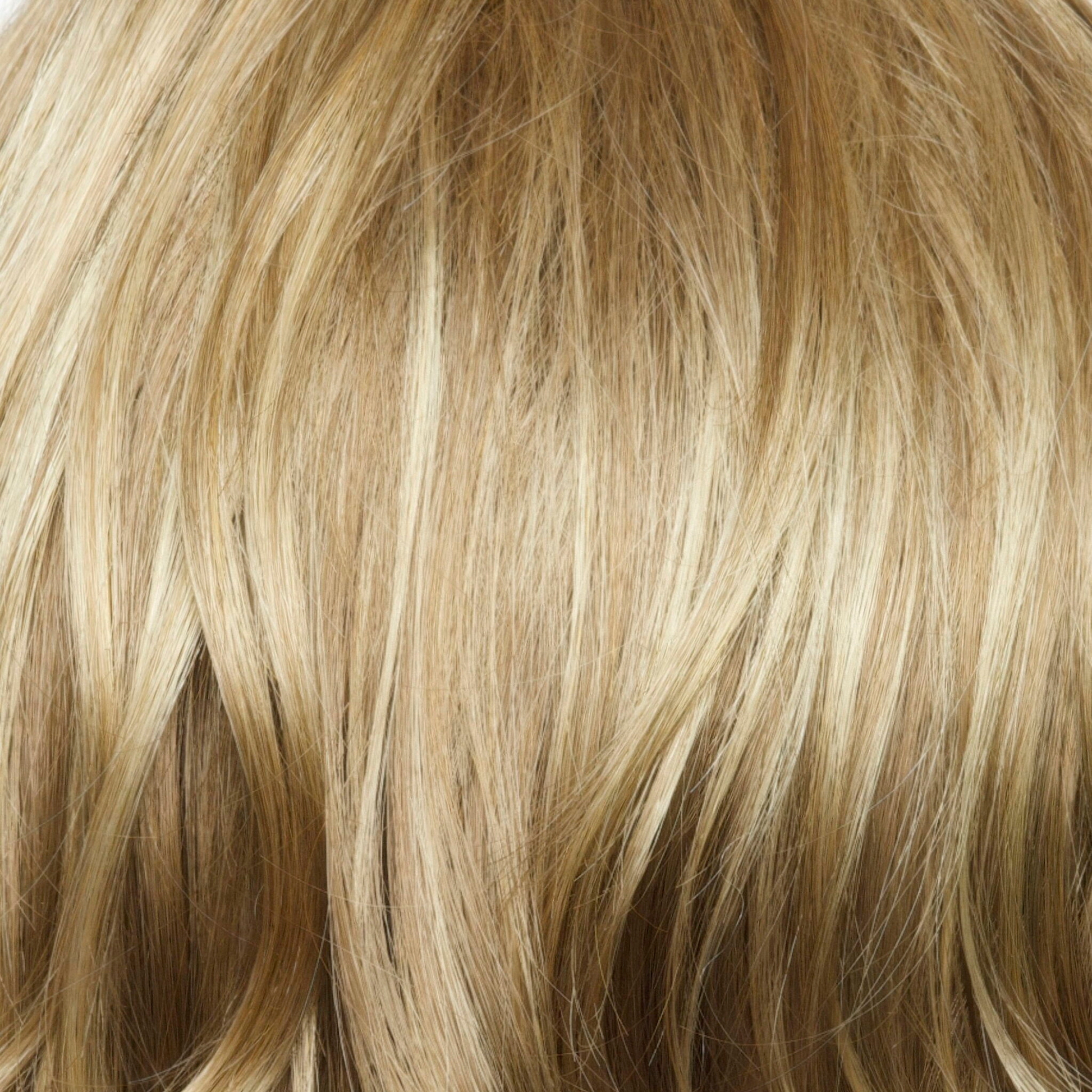 Golden Truffle Blond - A luscious and sophisticated shade of champagne blond with hints of pale cream and shimmering gold lights. This stunning blend exudes elegance and class, perfect for those looking for a chic and timeless hair color.