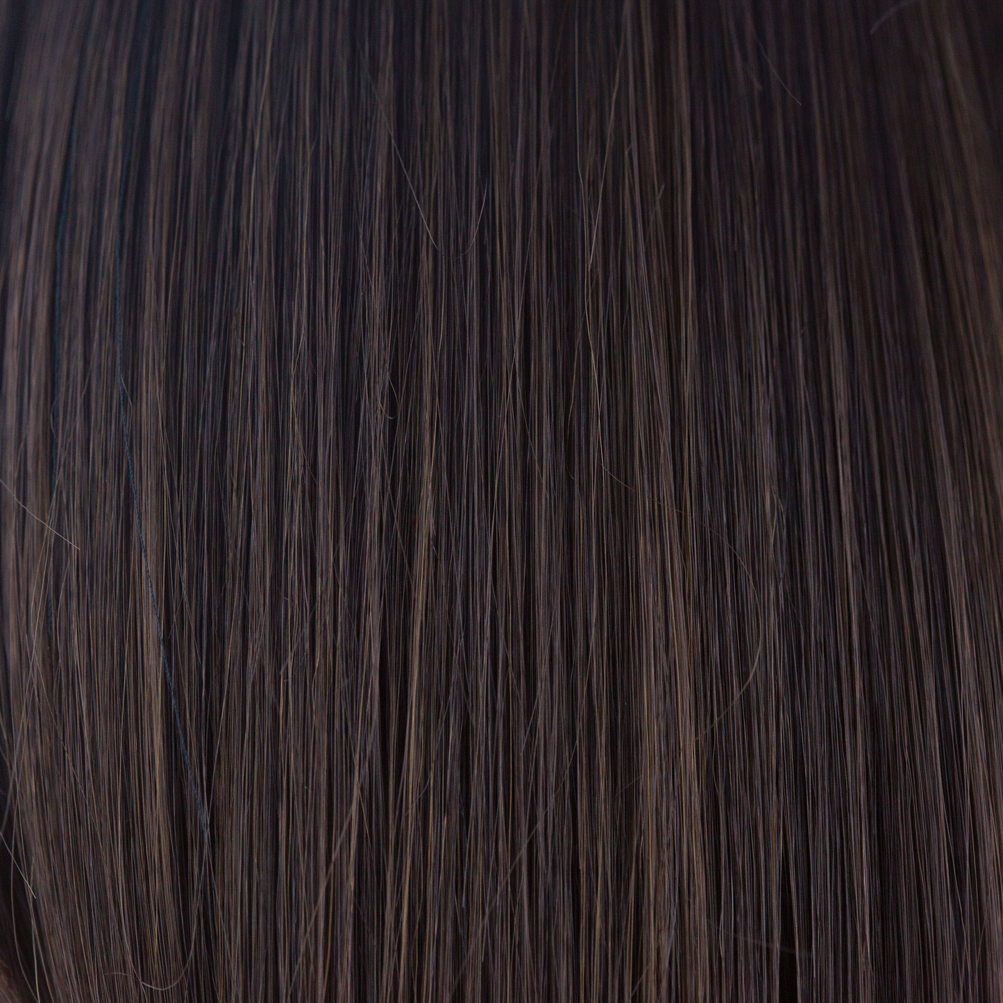 NM Dark Chocolate  -  The perfect neutral brown. Carefully crafter by blending a rich, deep chocolate brown with a cool medium brown tone, this color will look natural and real to those looking for a dark color.
