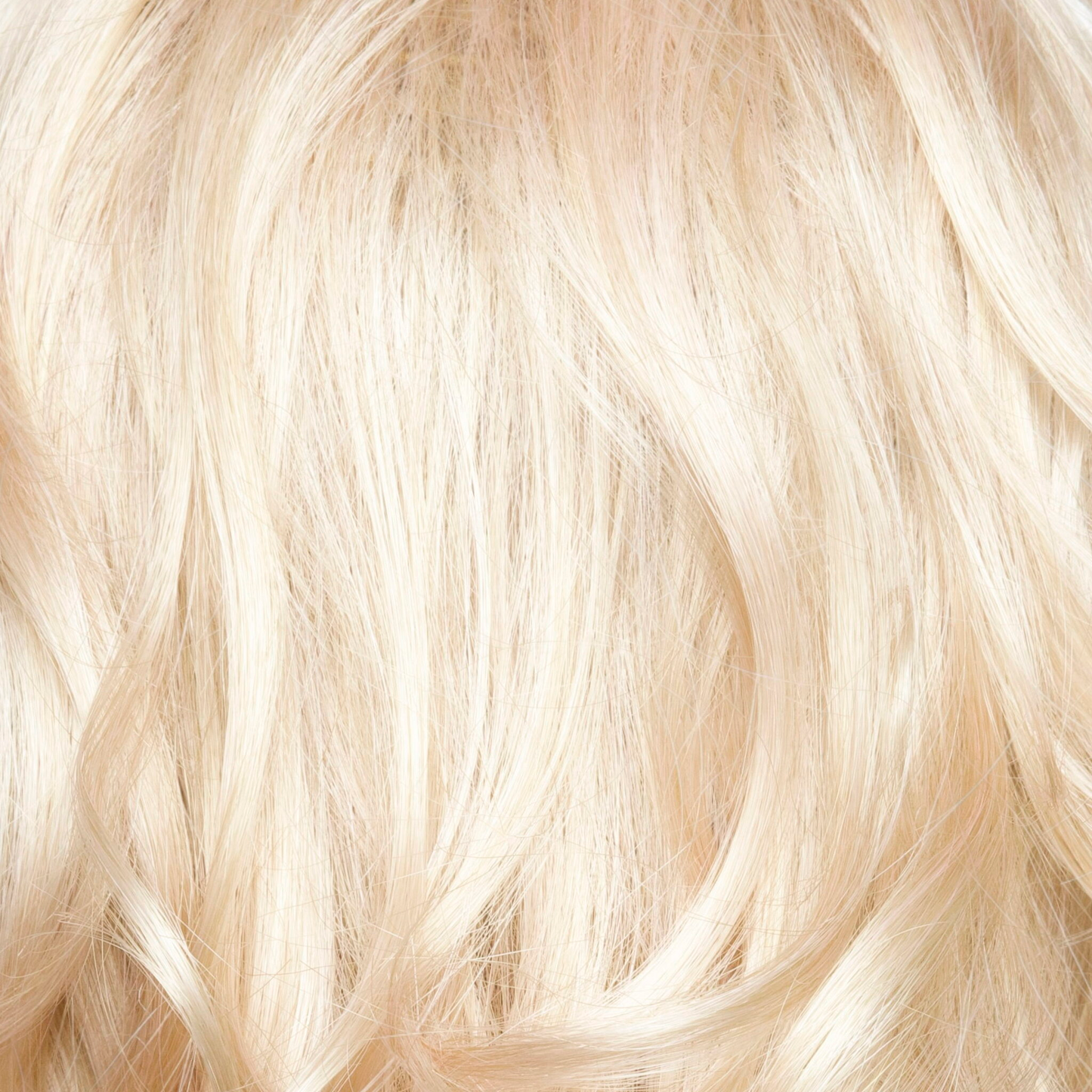 Snowy Peach  -  A beautiful and unique hair color that combines pale peach and platinum blond tones. 